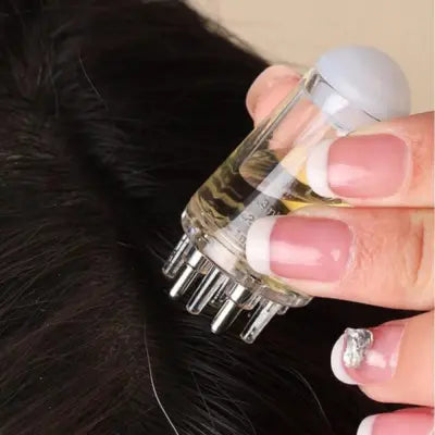 Al Tajar™ Hair Oil Applicator.